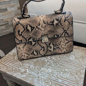 Chic Snakeskin Satchel in Black and Tan